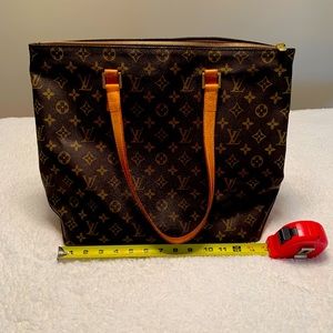 Louis Vuitton bag. Loved condition. Has water marks on the bottom.